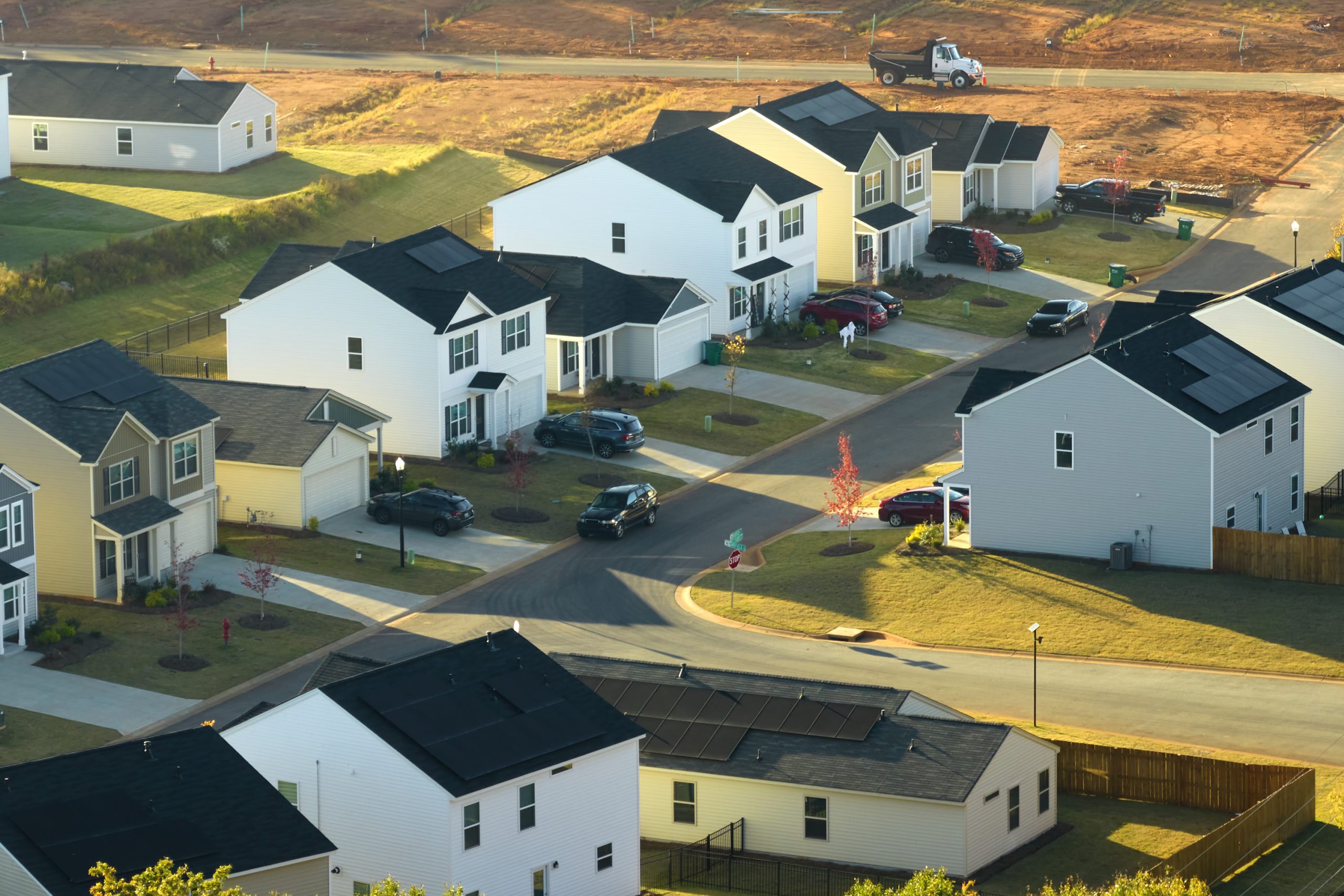 Ground prepared for building of new residential houses in South Carolina suburban development area. Concept of growing american suburbs.